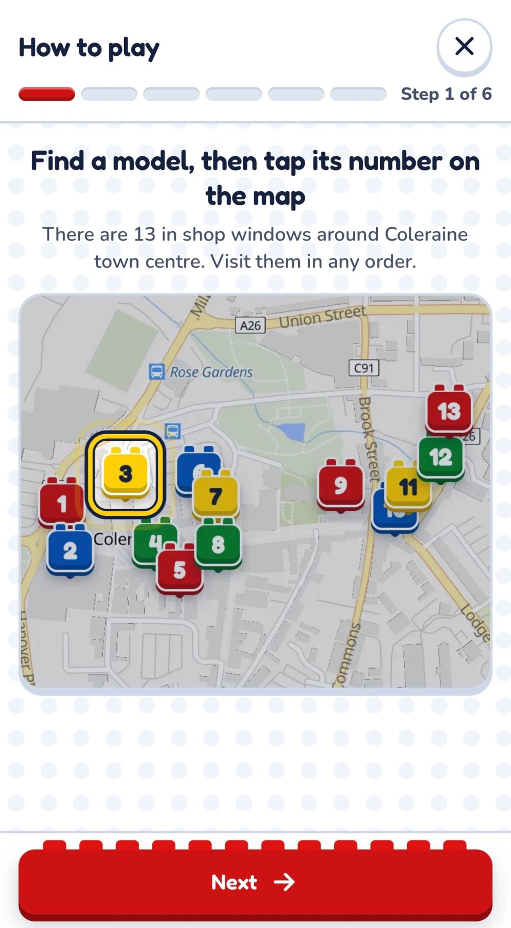 How to play step 1 of 6 in the trail app, showing the map with numbered brick pins
